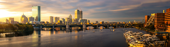 buildings with river in the center and marina on the right