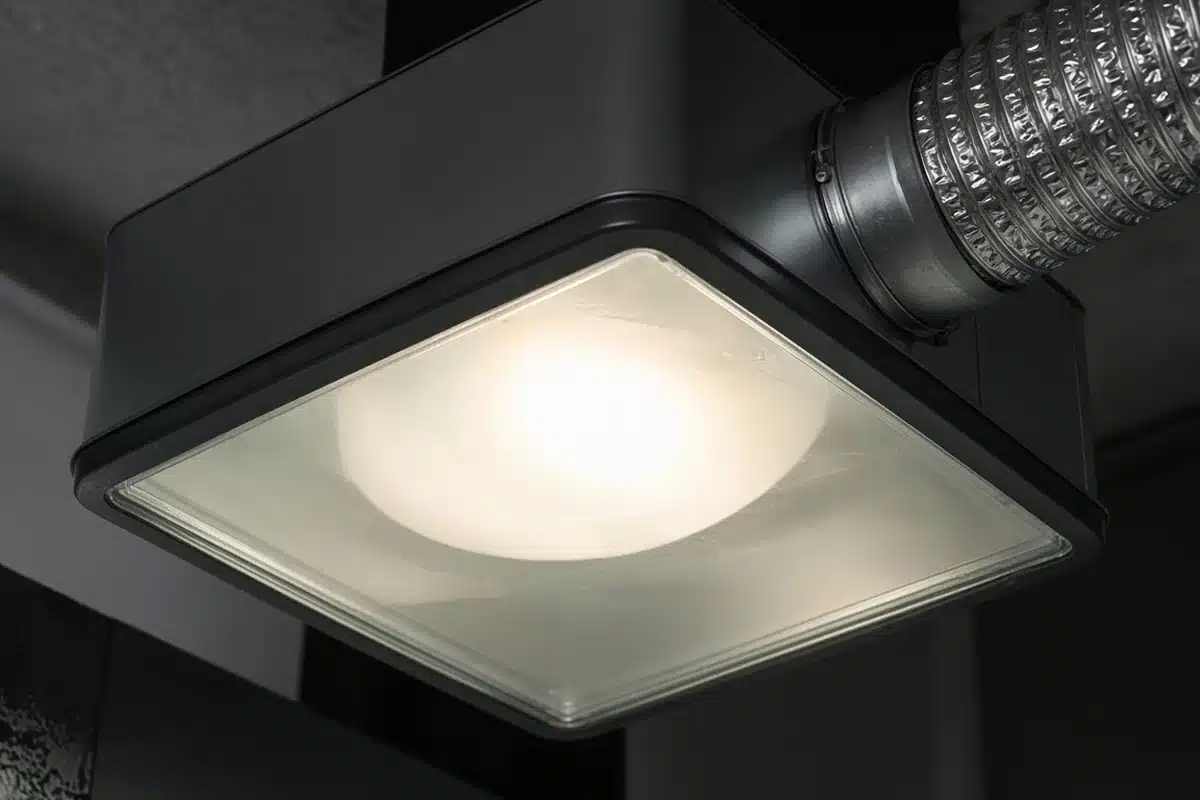 Glass lens on a ducted grow light hood