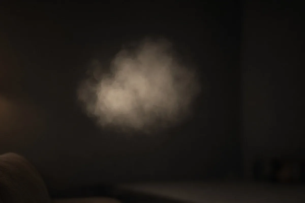Cloud of cannabis smoke against a dark background